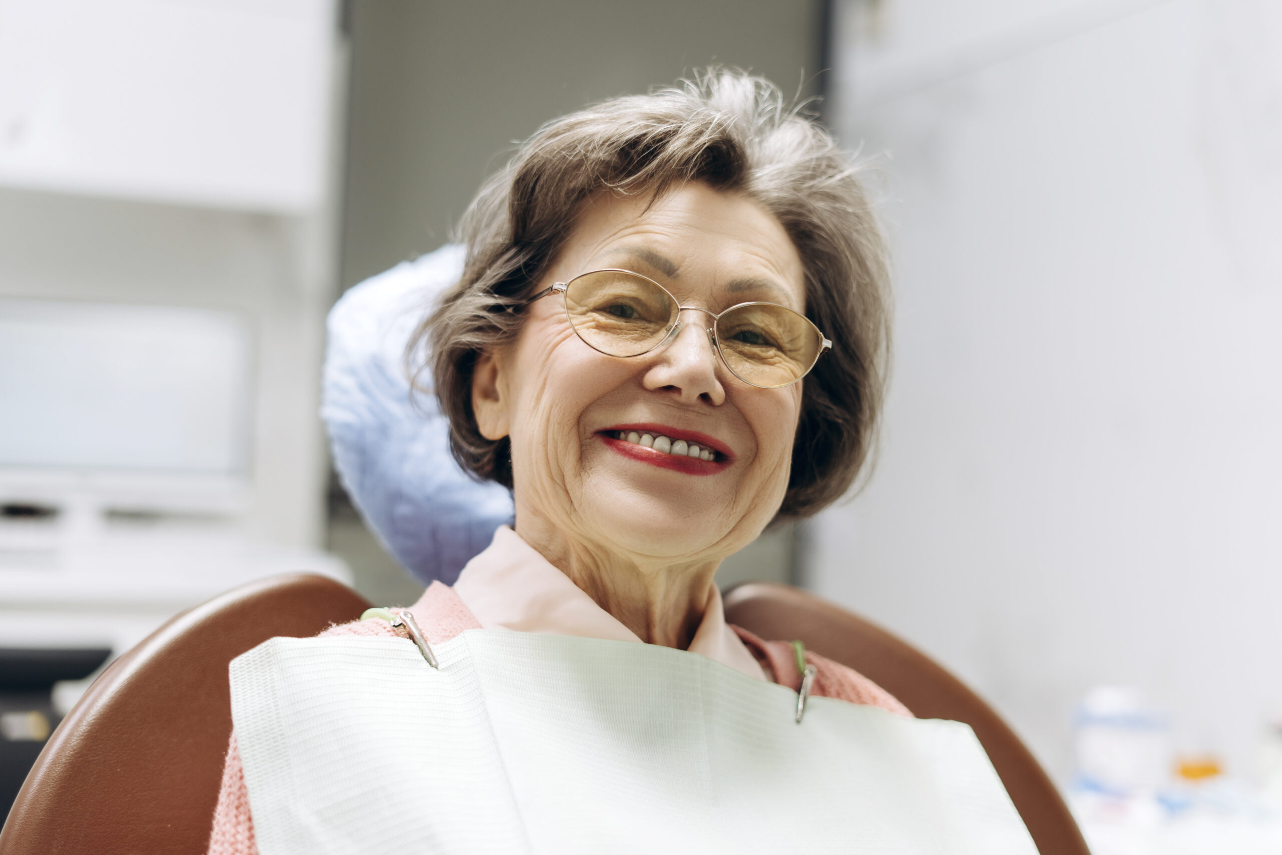 Senior woman smiling during dental checkup